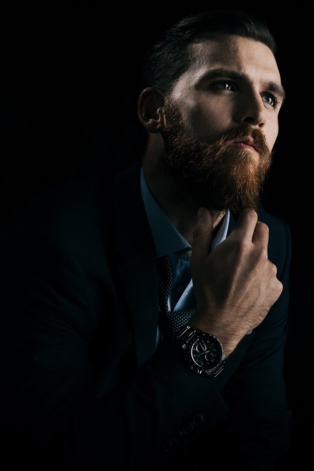A business, editorial portrait in flash light.